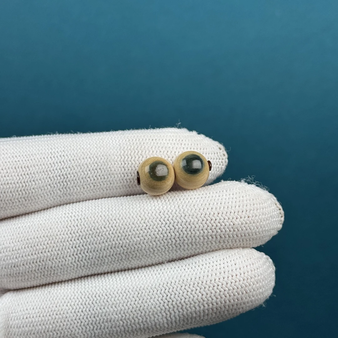 D90-87天然猛犸牙 蓝眼睛圆珠9mm支持复检