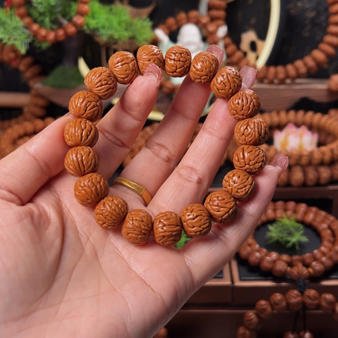 桃核手串14野生龙纹凤羽单圈