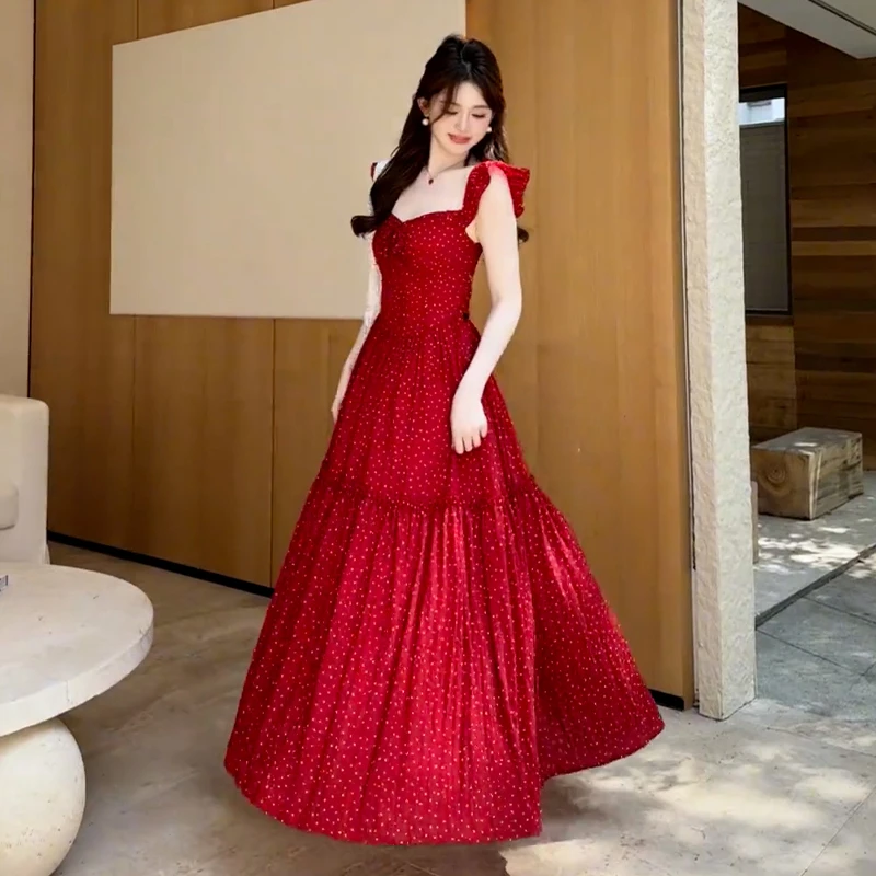 红色波点小飞袖吊带连衣裙子女装夏季2025新款爆款蝴蝶结露背长裙