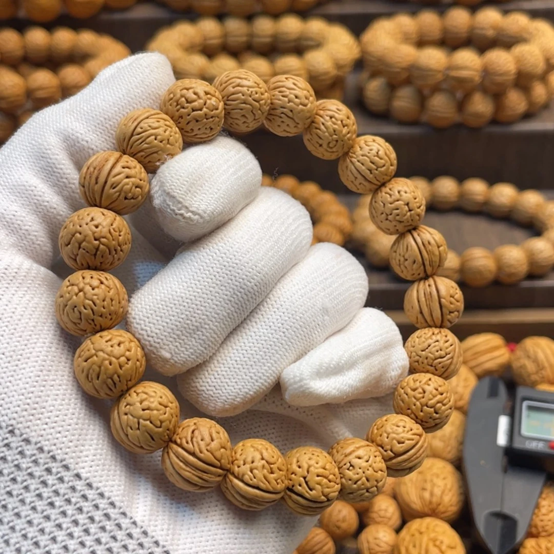 手串桃核野生玉麒麟