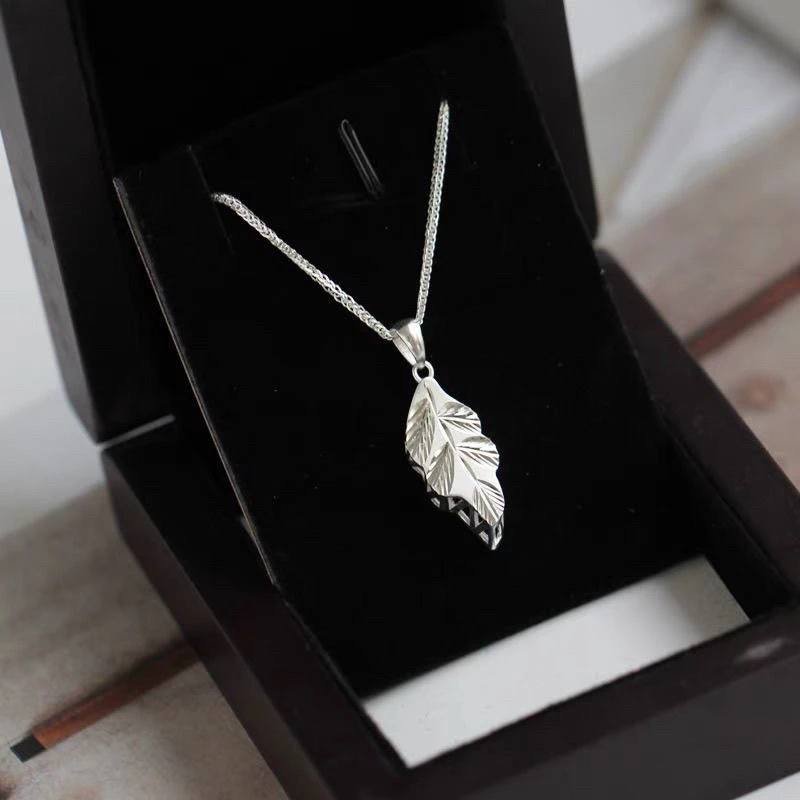 坠链均足银 足银重工金枝玉叶项链