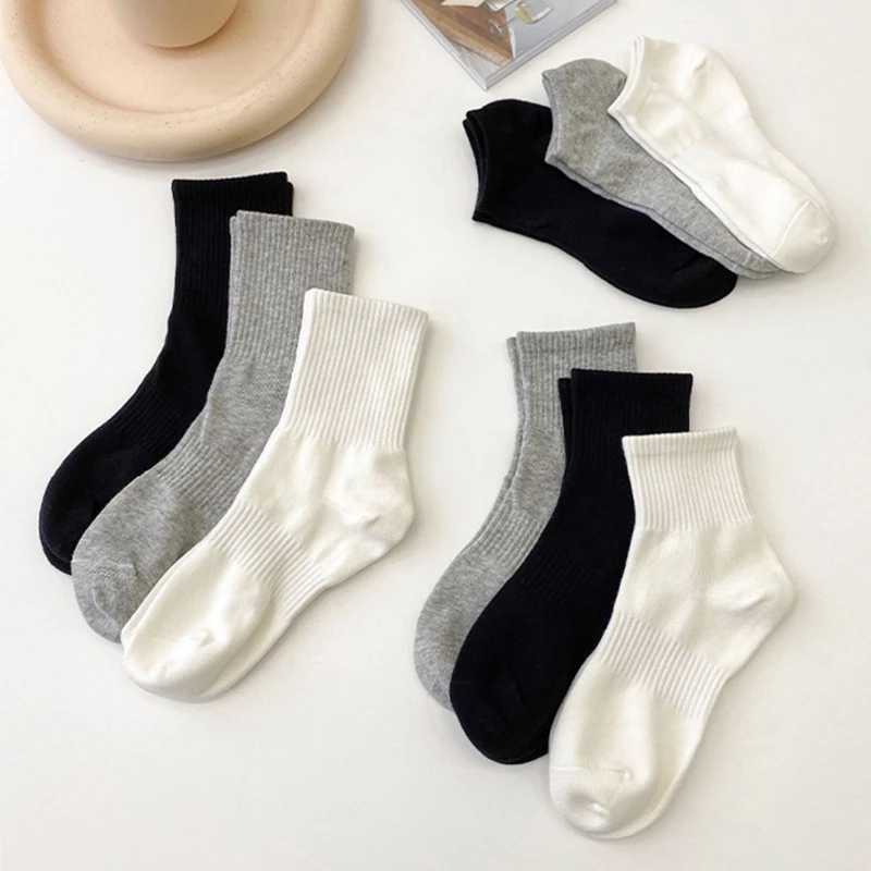 05中筒男士袜子春秋四季简约纯色黑白棉袜高橡筋百搭学生长筒袜