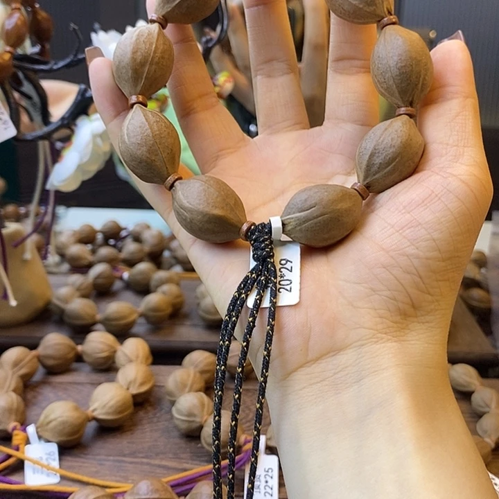 朝***雪橄榄核吊坠梅林铁核