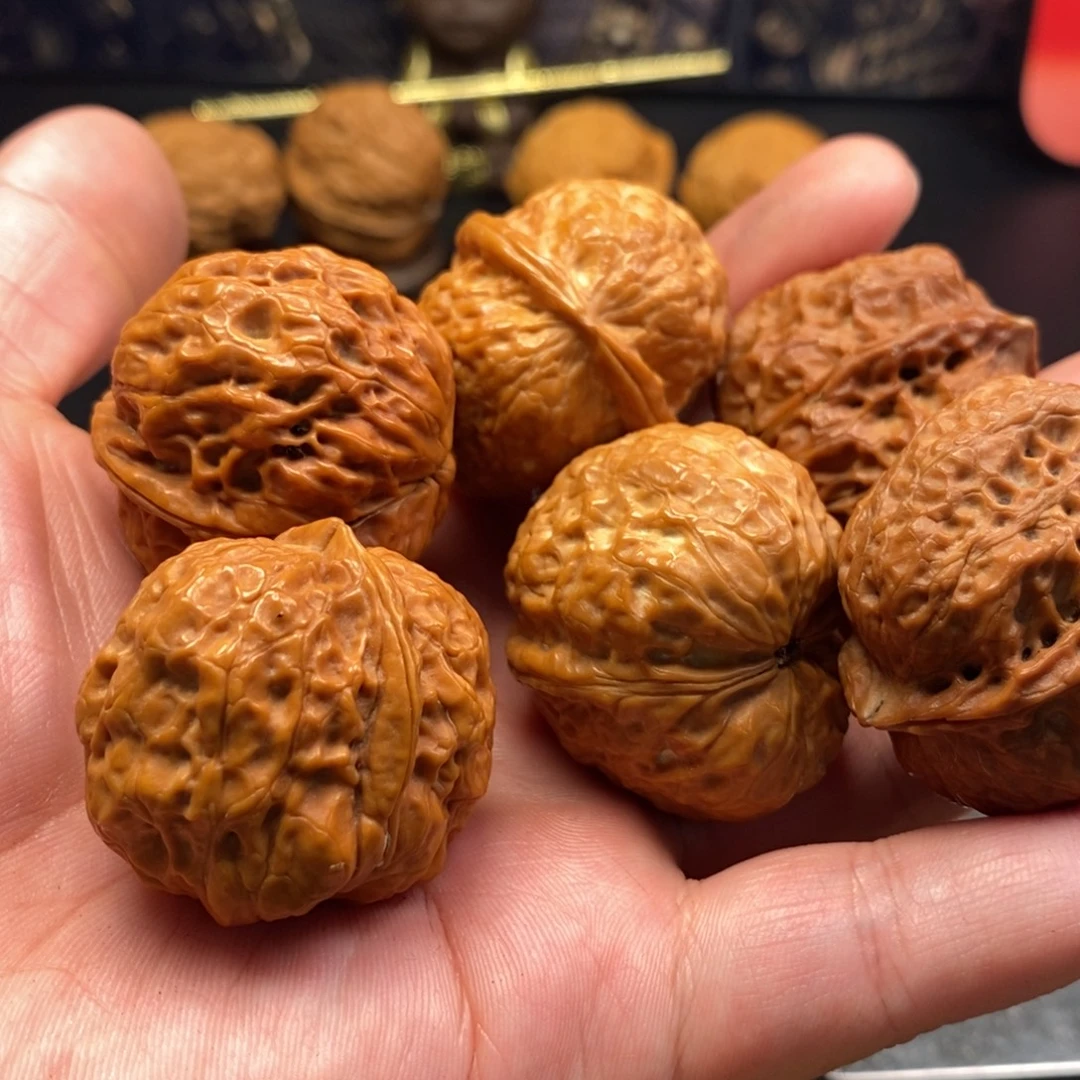 乌***三文玩核桃把件云铁套