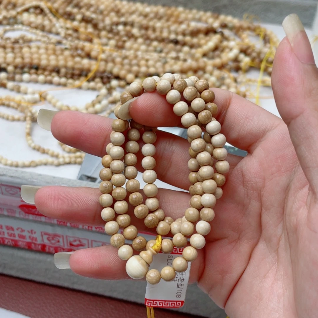 吊坠柏香籽/百香籽猛犸牙咖色脖挂