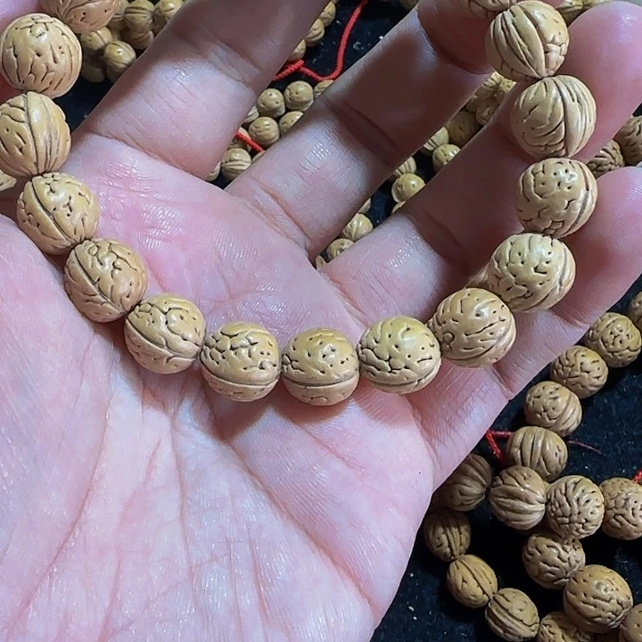 郭***明野生桃核大肠纹手串