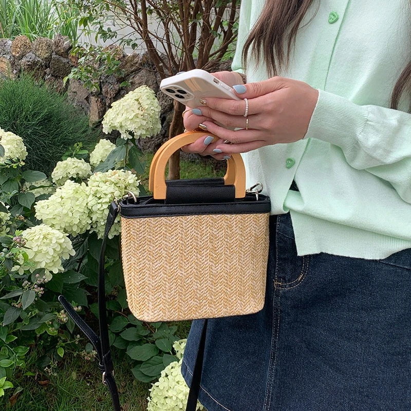 ins风草编包女款小众设计感编织手提包斜挎包新款潮流棕色黑色春