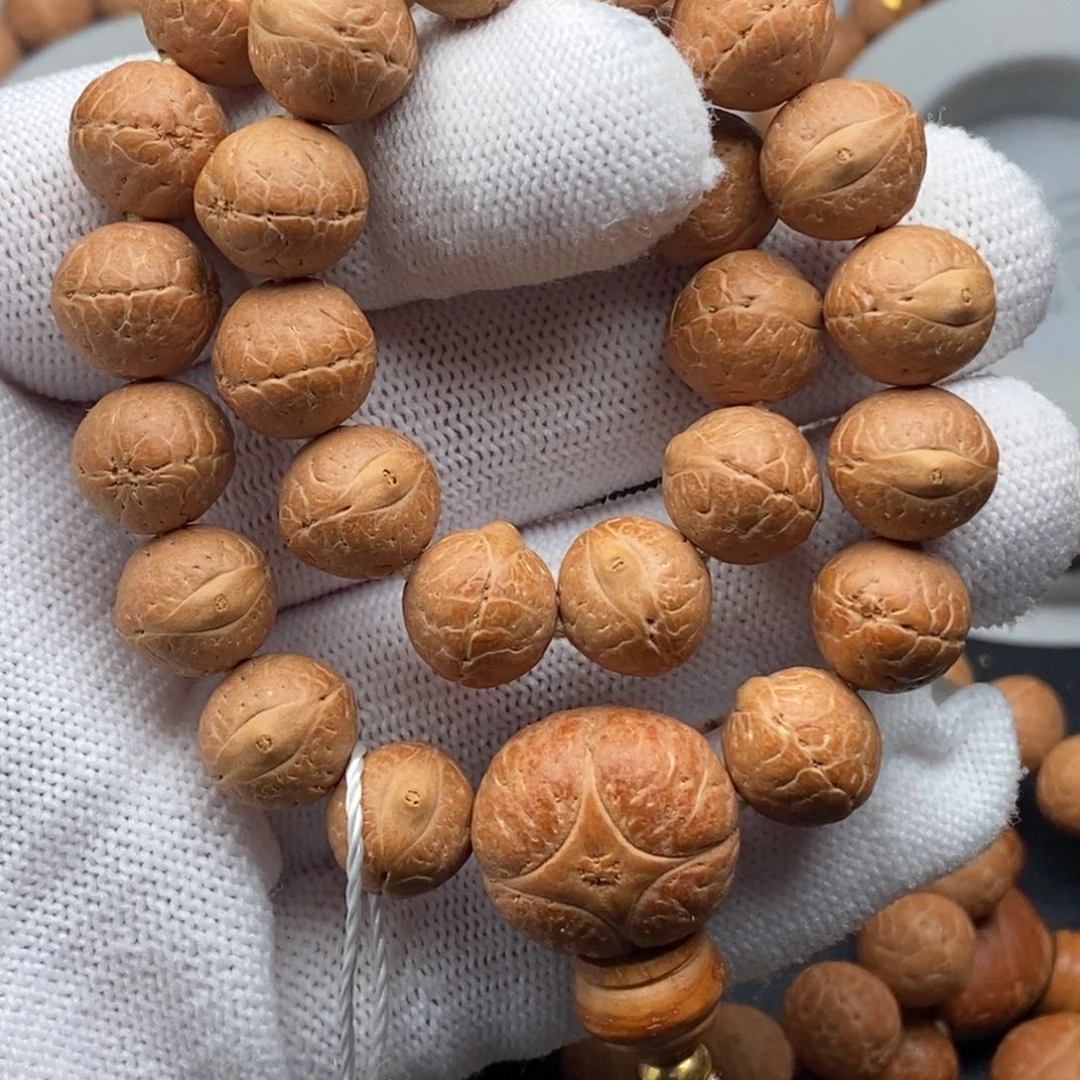 小***爪手串凤眼菩提实心12mm27颗