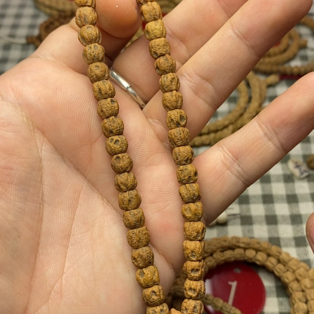 柏香籽/百香籽吊坠热振红油皮红芽口鬼脸手持7.5左右