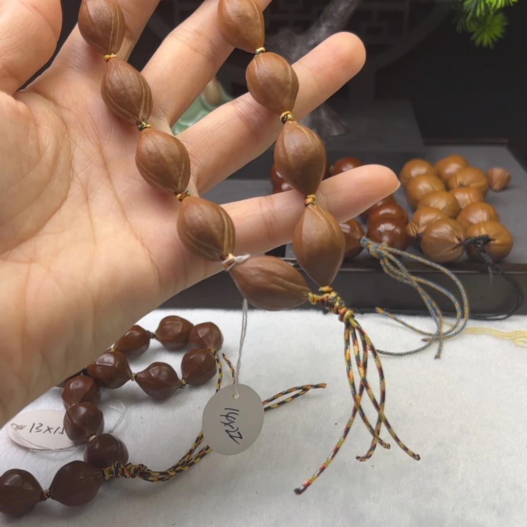 橄榄核手串/手链1.4*2.2原皮铁核