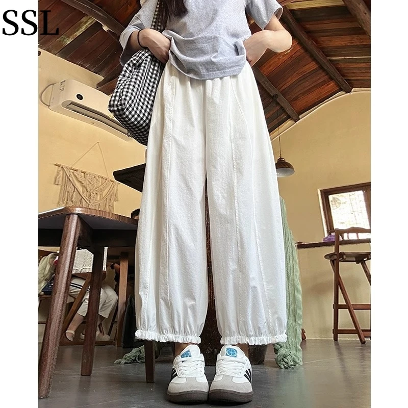 白色花苞阔腿灯笼裤女2025夏季新款高腰宽松休闲花边裤脚气球裤