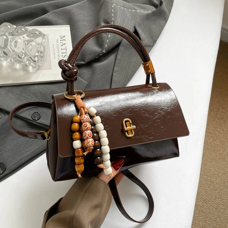 秋冬潮流小众韩版设计纯色锁扣小方包法式简约百搭单肩手提斜挎包