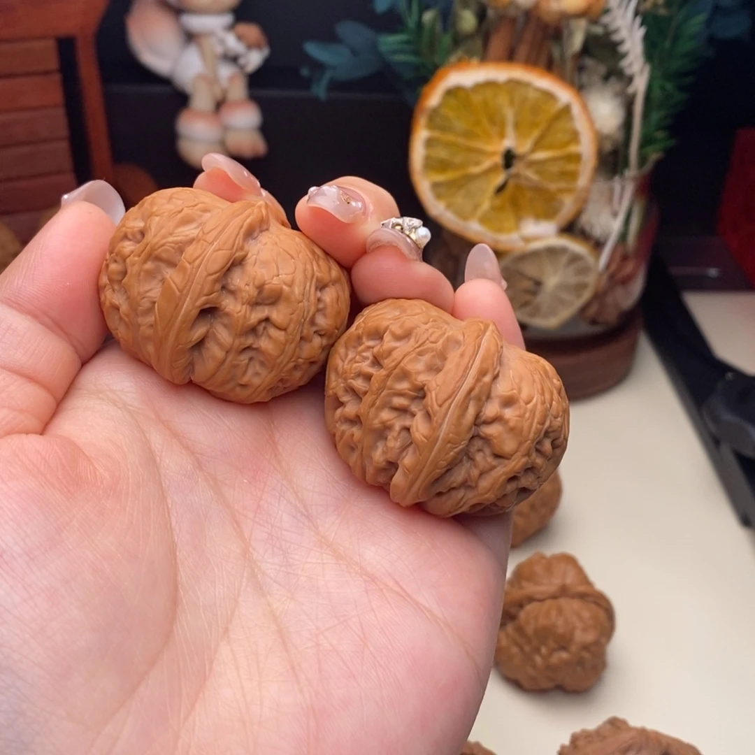 离***别桃核把件平谷元宝