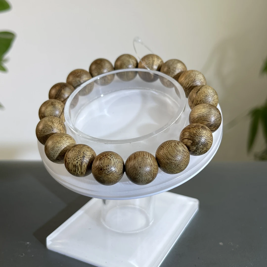 JZY15-79  柬埔寨金丝飘花蜜结手串 约：17颗*12mm