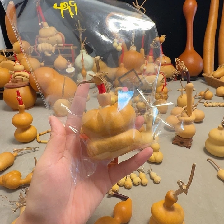 路***S小熊手把钱袋子响籽厚皮