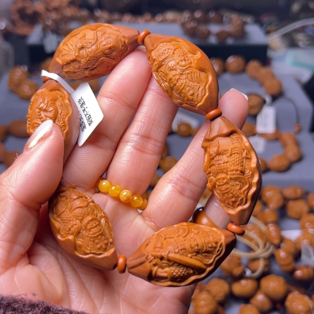 橄榄核吊坠隔***?橄榄核手串