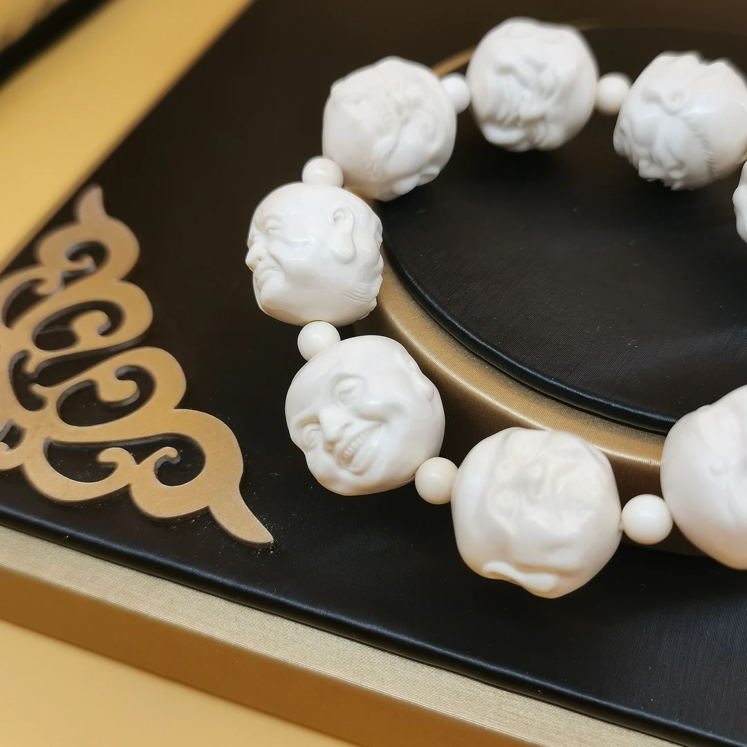 666125 天然猛犸牙～9粒十八罗汉手串 18mm