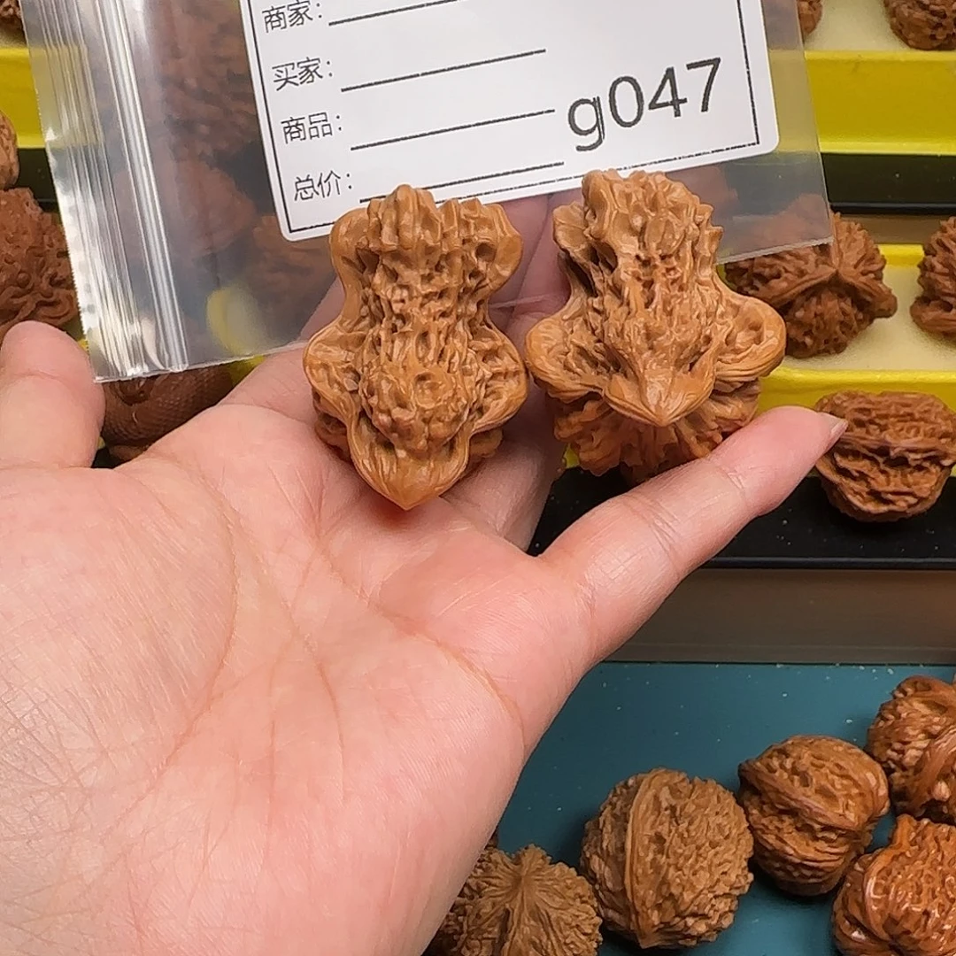 8***0橄榄核吊坠文玩的