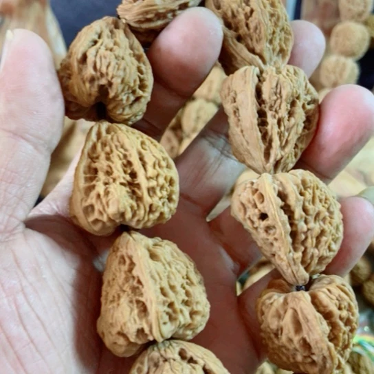 ^***边文玩核桃吊坠南疆