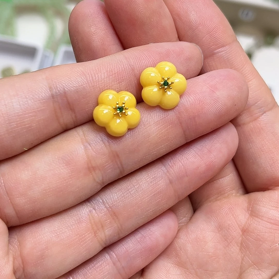 璎***珞琥珀银S925镶嵌耳饰