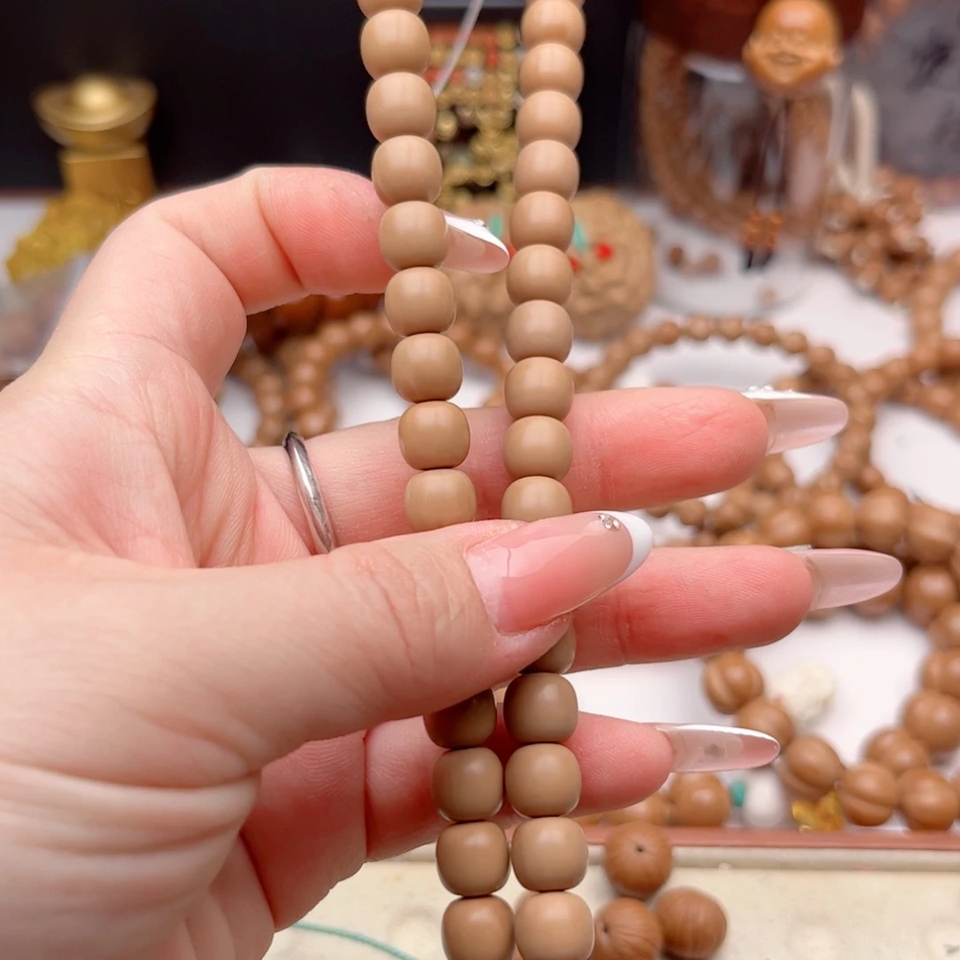 晓***晓猴头核桃手串老邢老料