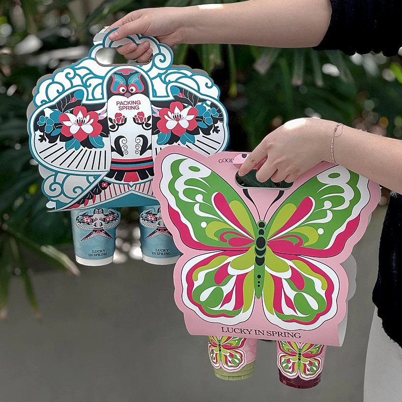 网红爆款咖啡杯子一次性春日纸杯冷热饮镂空打包杯提带盖杯套定制