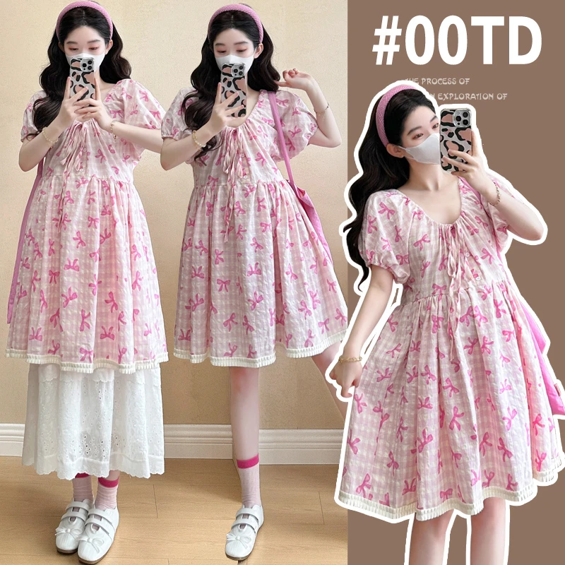 甜美显瘦孕妇装夏季新款爆款宽松设计感时尚减龄蝴蝶结印花连衣裙