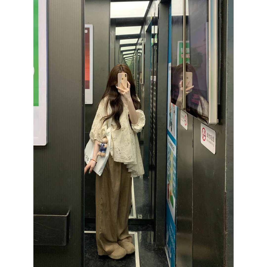通勤女装高级感套装女2025夏季不规则镂空衬衫阔腿休闲裤两件套装