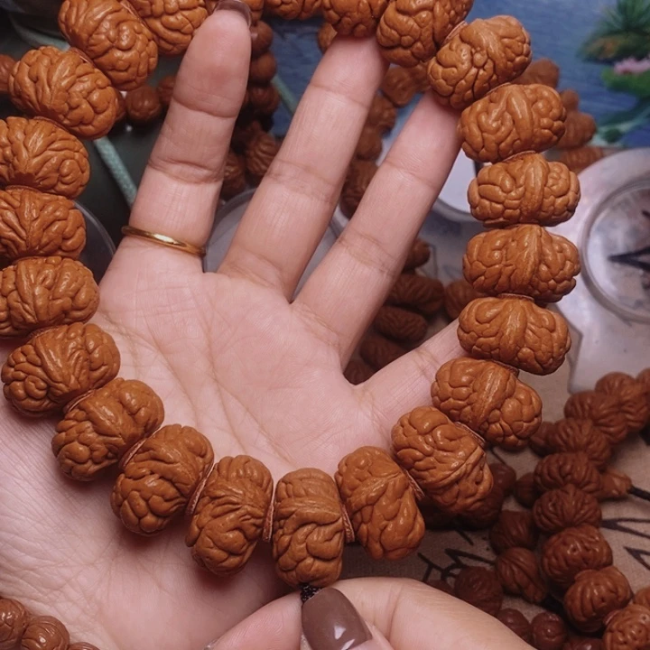 刘***哥手串文玩核桃龙纹桃核