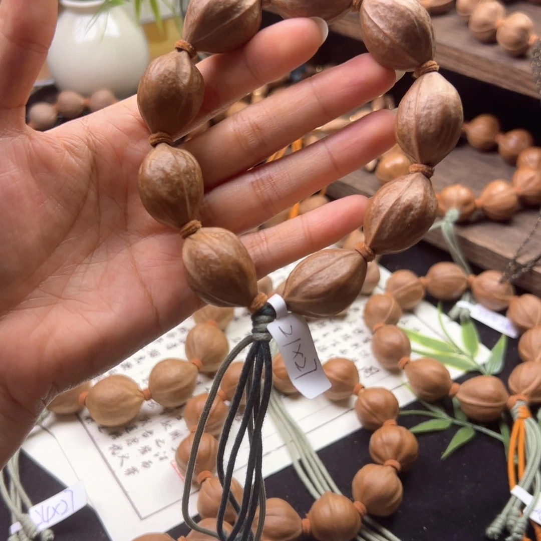 手串橄榄核7*?003。21×27梅林