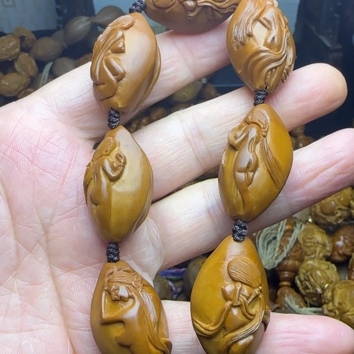 用***5橄榄核雕刻手串生命