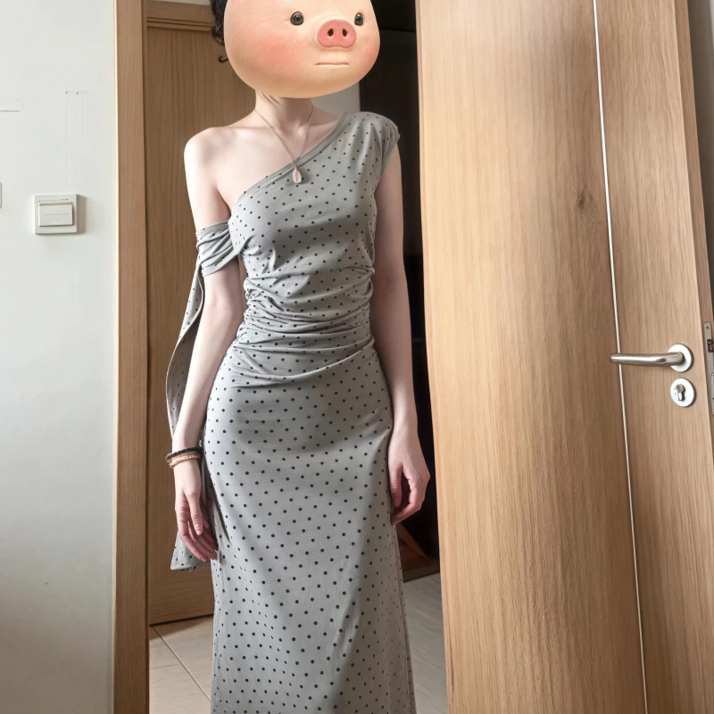 纯欲风波点斜肩飘带连衣裙女夏季新款高级感气质性感收腰包臀长裙