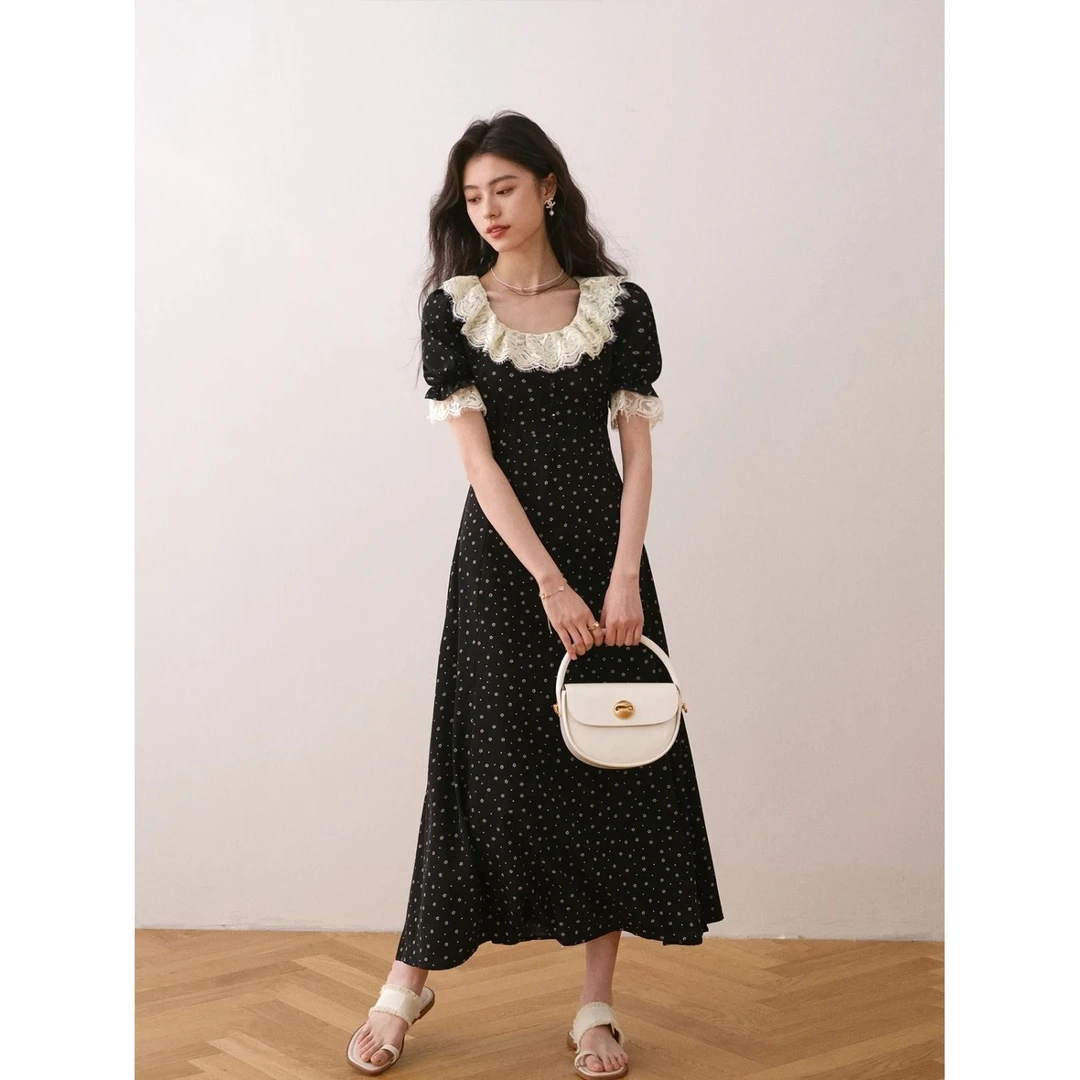 黑色法式荷叶领甜美碎花连衣裙2025电力新款中长款轻奢短袖茶歇裙
