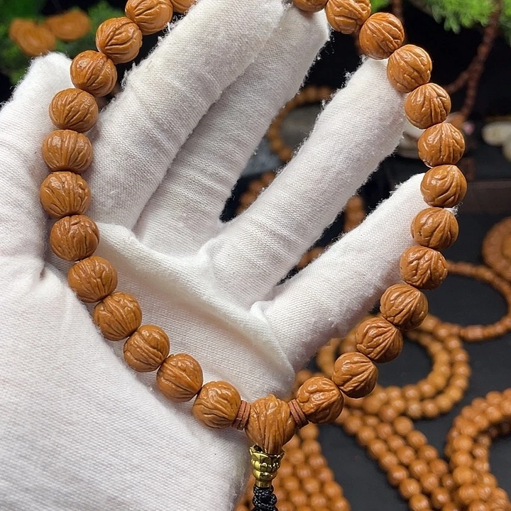 辰***妈桃核吊坠秦岭龙纹桃核