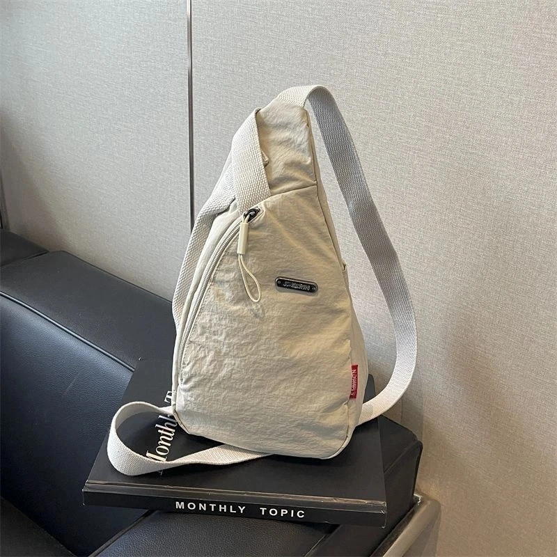 时尚简约男女胸包手机斜跨包骑行包休闲百搭轻便运动风中性背包
