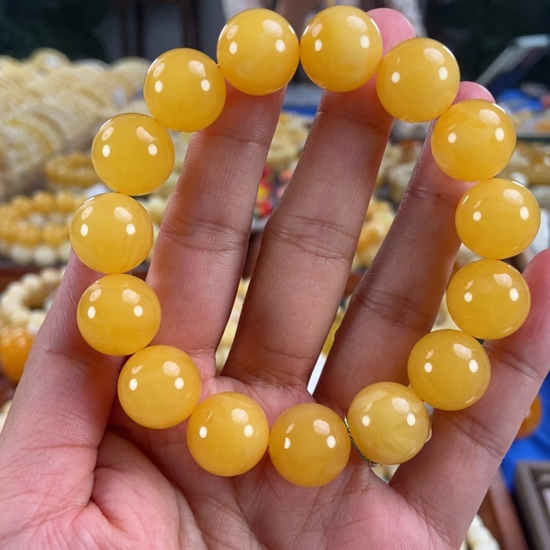 琥珀未镶嵌珠宝奇石15同料鸡油红圆珠29.54