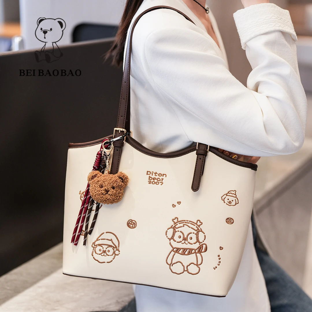 2025新款托特包包女通勤大容量小熊手提单肩女式包8588