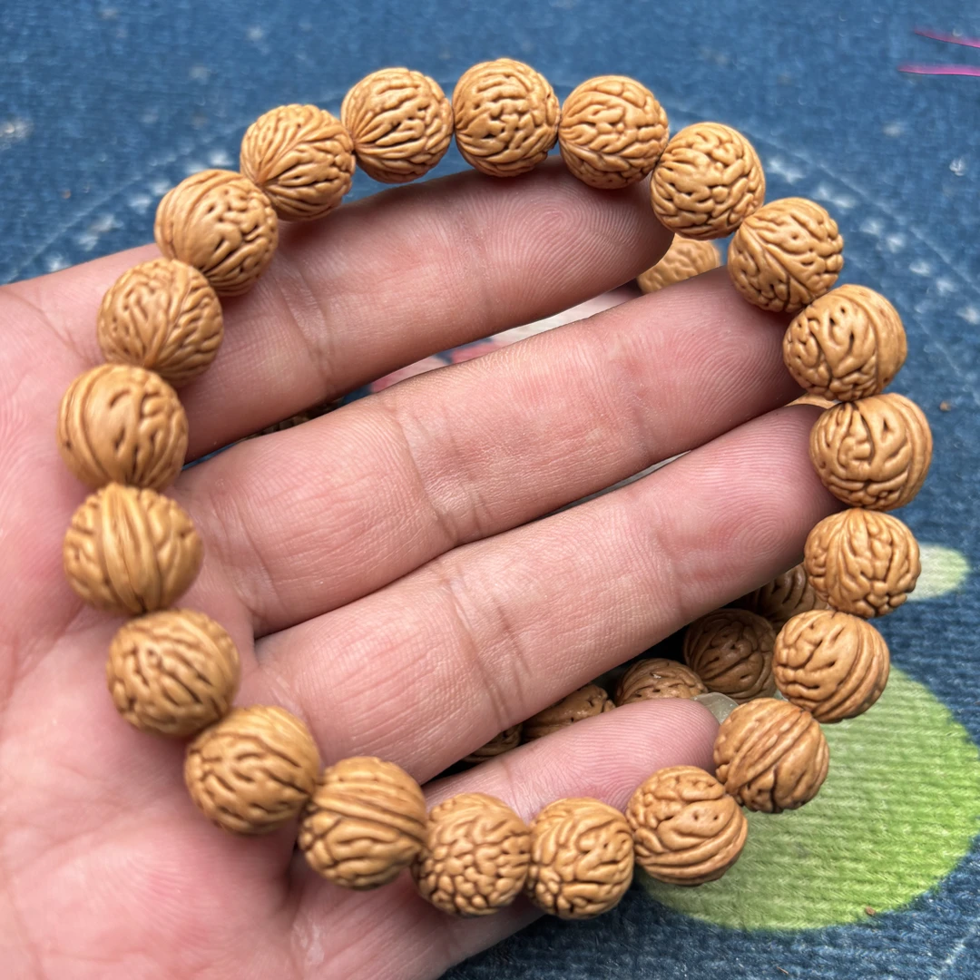 野生大肠纹理，尺寸1.2以内，支持定制，归圆度高，精选桃核手串