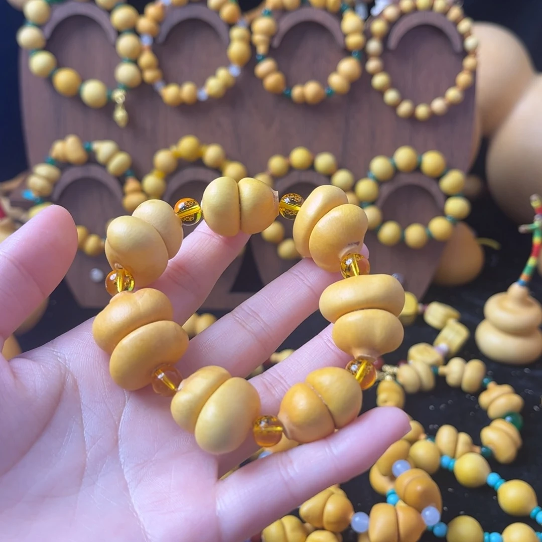 、****丁七颗小钱袋手串