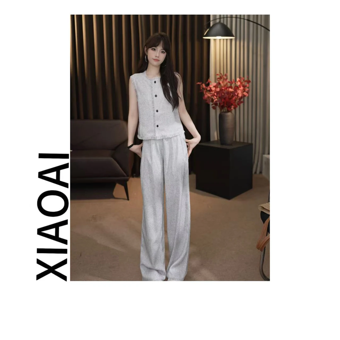 A007 气质无袖背心女夏季新款宽松显瘦流苏马甲+直筒裤套装
