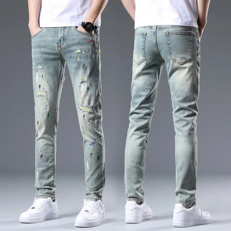 【高端轻奢】时尚设计感牛仔裤男破洞泼墨油漆潮牌修身小脚裤子男