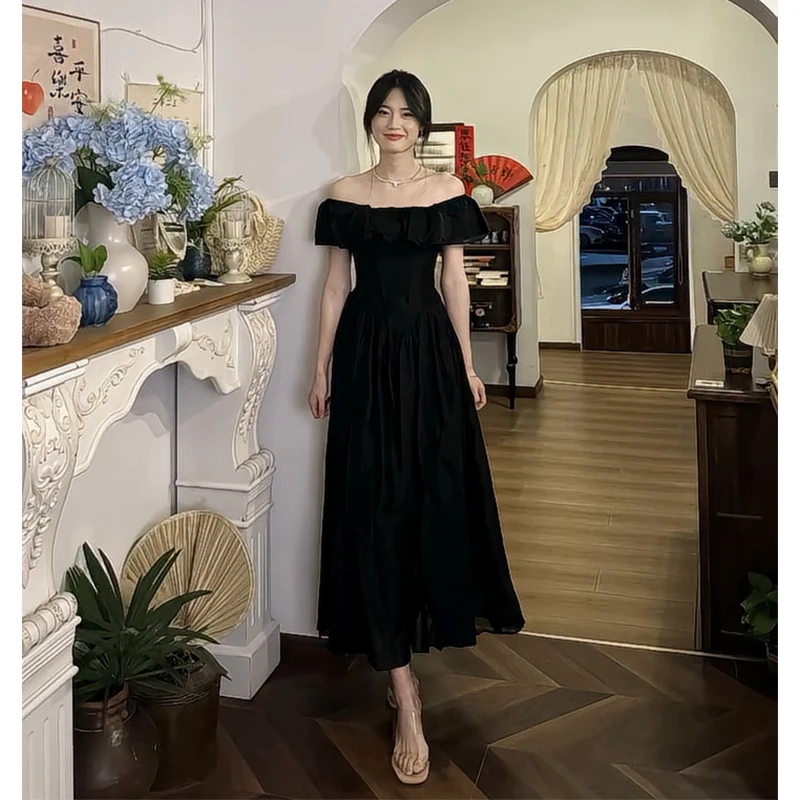 设计感连衣裙2025夏季新款法式气质一字肩收腰显瘦短袖中长款裙子