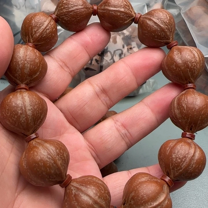你***辉橄榄核手串橄榄核原皮铁核