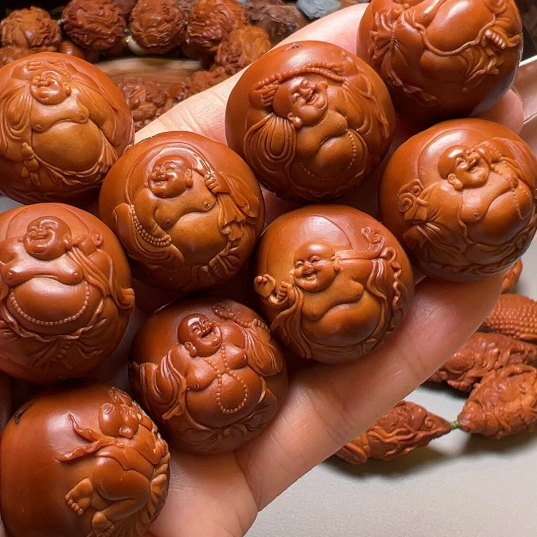手串橄榄核浮雕童子弥勒