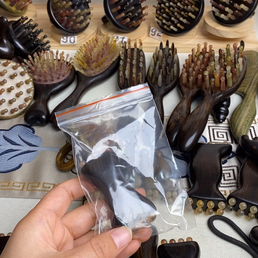哈***8紫光檀按摩梳子按摩