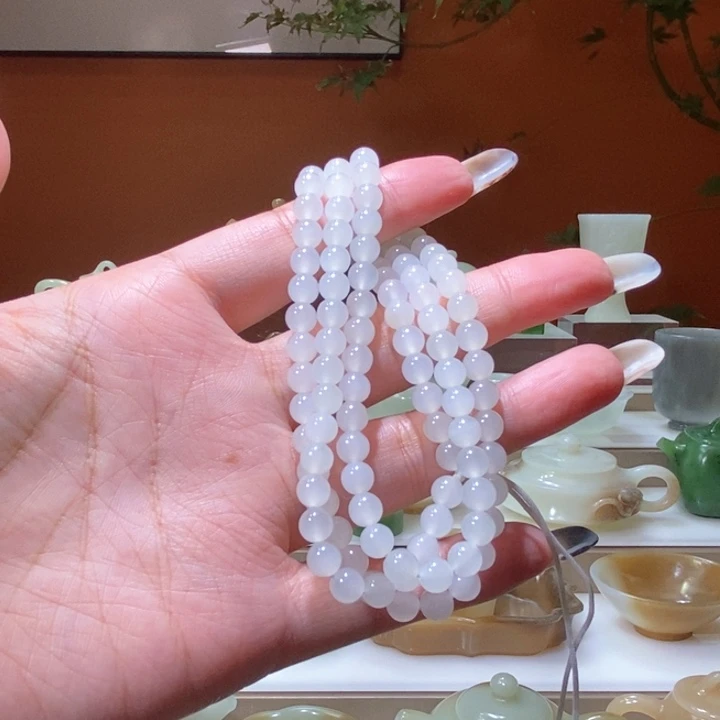 未镶嵌和田玉摆件于田白玉串