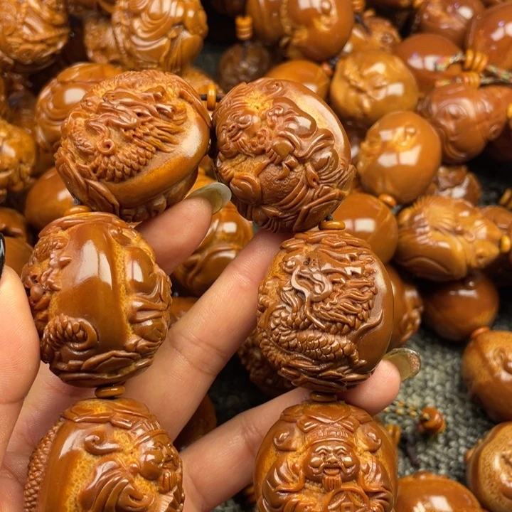 橄榄核吊坠时**见橄榄核