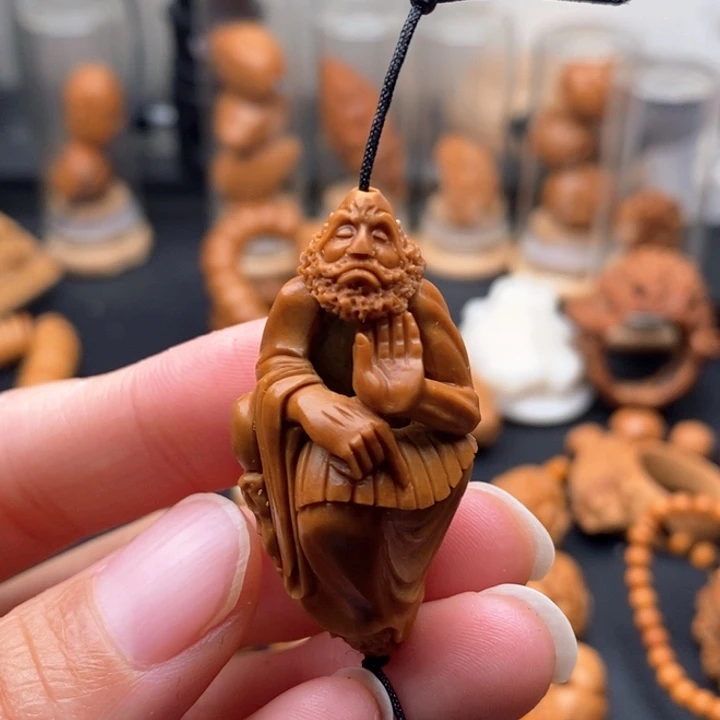 橄榄核吊坠阿****7达摩单子