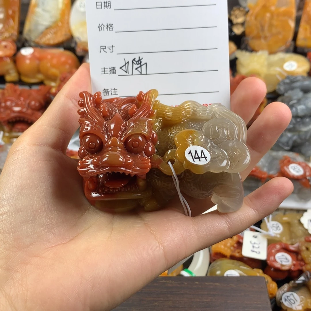 ζ***月石英质玉（黄龙玉）未镶嵌手把件