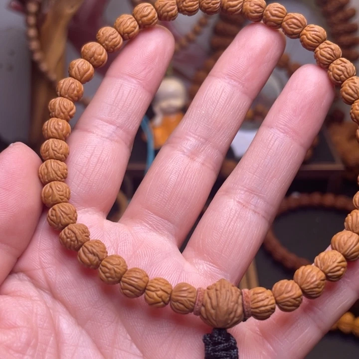 江***物桃核吊坠龙文桃核